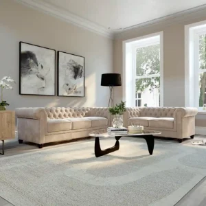Cream Chesterfield 3+2 seater sofa with plush velvet fabric, deep button tufting, and thick fibre-filled seating for a timeless look