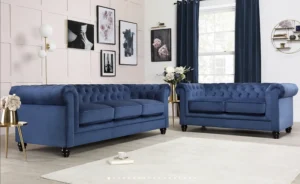 Sophisticated navy blue Chesterfield 3+2 seater sofa with plush velvet upholstery, high-density foam seating, and UK Fire Safety compliance.