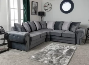 Verona corner seater sofa in steel plush velvet material, offering comfort and luxury with a stylish design