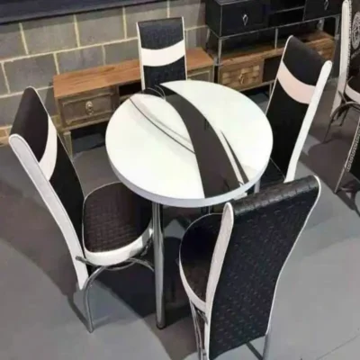 modern round dining table with 4 chairs perfect for uk homes