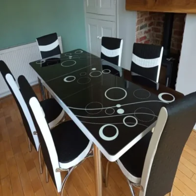 Black and white gloss extendable dining table with velvet chairs UK
