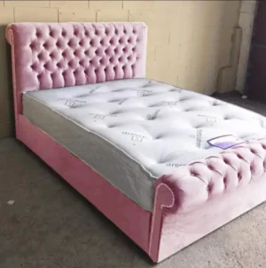 Modern sleigh bed with optional storage in grey silver, pink, blue, and black – available in the UK.